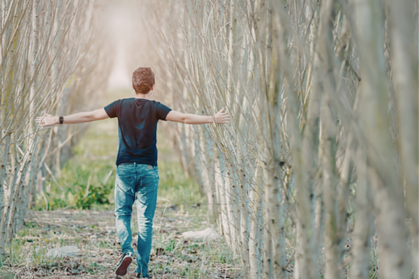Person walking calmly along a quiet path symbolizing anxiety therapy at your own pace and personal healing journey