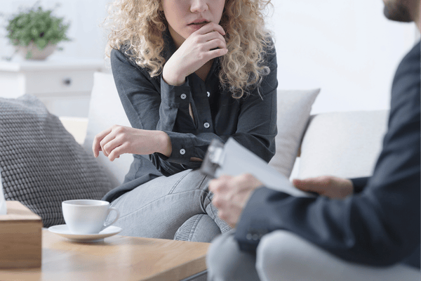 Client speaking with therapist during a session, highlighting the importance of finding the right therapist for anxiety therapy and feeling understood